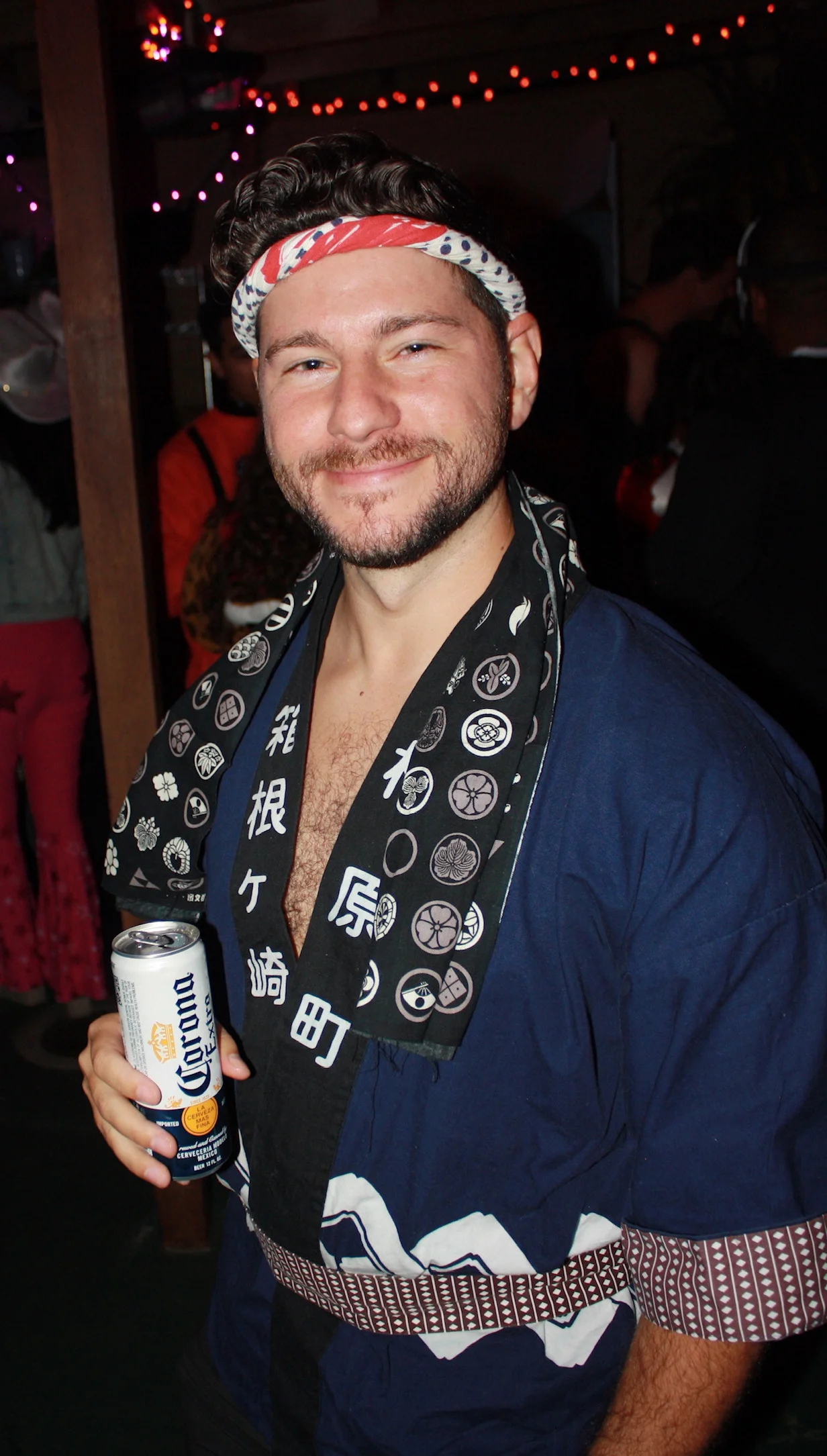 Guest wearing a hat and patterned Halloween costume